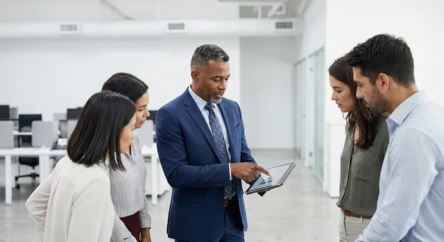 company, team, collaboration, office, meeting, technology, tablet, diverse, professionals, leadership, presentation, data, teamwork, modern, communication, strategy, innovation, group, workplace, accompaniment, ai generated. Why AI content operations measurement mistakes keep recurring in UK teams