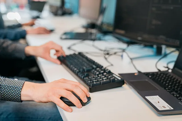 computer, typing, keyboard, work, office, workspace, workplace, desk, office work, computer desk. How to compare AI content operations pricing models before you sign