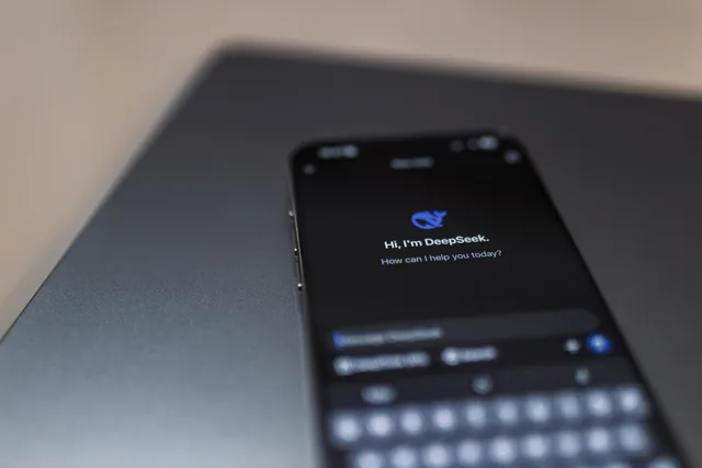 Close-up of a smartphone displaying an AI chat interface with the DeepSeek app. AI content tools: selection checklist explained