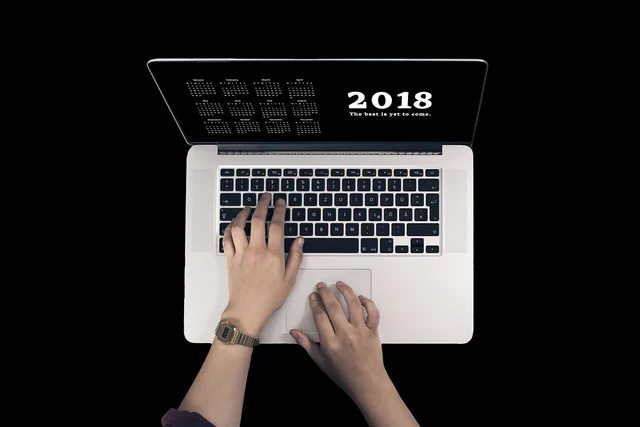 laptop, keyboard, hands, hand, year, new year's day, calendar, screen, keys, pc, write. How to plan an AI content operations strategy before you choose software