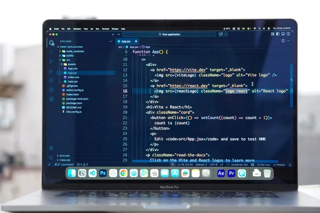 Laptop with code editor open on a rooftop, showcasing remote web development and modern work flexibility. One rulebook or several for AI content operations UK regulations